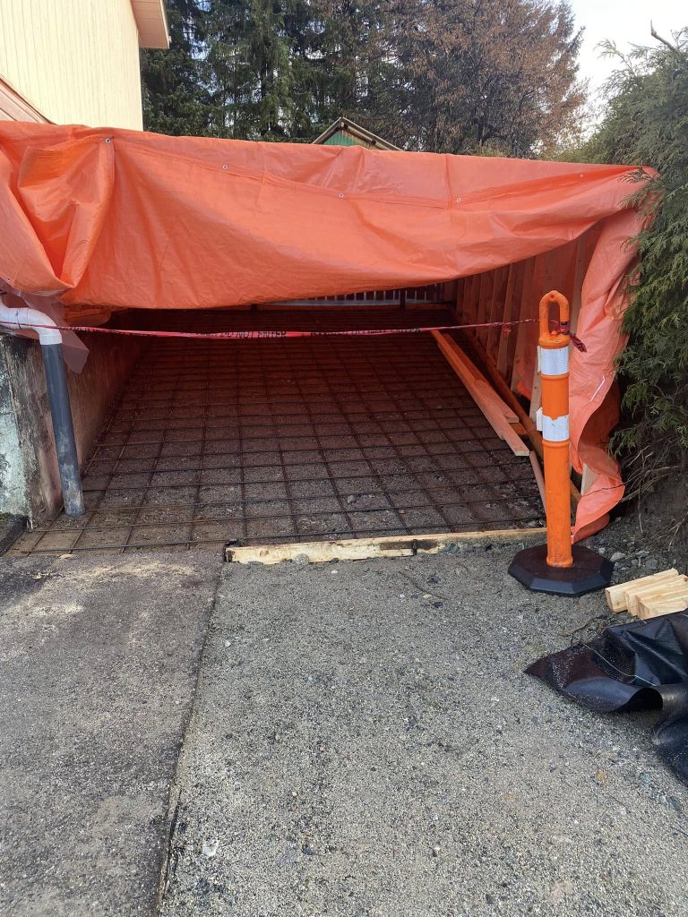 Concrete slab area covered during construction preparation